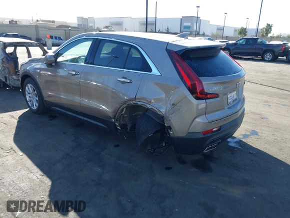 2023 Cadillac XT4 FWD Luxury z VIN 1GYAZAR40PF135132, wystawiony jako IAAI lot #41684609 z przebiegiem 12 164 mil mil oraz . Historia ofert i sprzedaży dostępna na DreamBid. Obrazek 3.