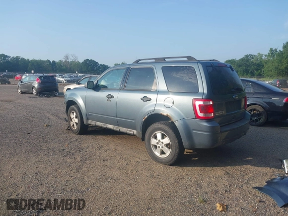 2011 Ford Escape XLT with VIN 1FMCU9D77BKB11600, listed as a IAAI auction lot 42579732 with 147,247 mi miles and . Bid and sale history available at DreamBid. Image 3.