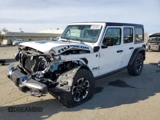 2024 Jeep Wrangler Rubicon with VIN 1C4RJXR6XRW115879, listed as a Copart auction lot 45816825 with 34,557 mi miles and Salvage Title. Bid and sale history available at DreamBid. Image 1.
