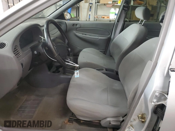 2002 Ford Escort Fleet Standard with VIN 3FAFP13P82R144456, listed as a Copart auction lot 58832935 with 124,502 mi miles and Salvage title. Bid and sale history available at DreamBid. Image 7.