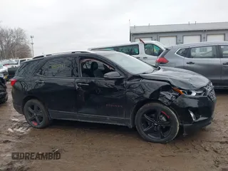 2021 Chevrolet Equinox Premier z VIN 2GNAXNEV4M6125086, wystawiony jako IAAI lot #41475387 z przebiegiem 53 387 mil mil oraz . Historia ofert i sprzedaży dostępna na DreamBid. Obrazek 13.