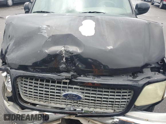2002 Ford Expedition Eddie Bauer with VIN 1FMPU18LX2LA39571, listed as a Copart auction lot 58774915 with 388,886 mi miles and Salvage title. Bid and sale history available at DreamBid. Image 12.