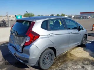 2020 Honda Fit LX z VIN 3HGGK5H48LM700879, wystawiony jako IAAI lot #42290266 z przebiegiem 90 963 mil mil oraz . Historia ofert i sprzedaży dostępna na DreamBid. Obrazek 4.