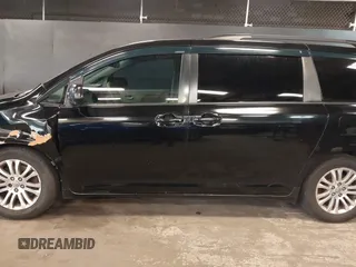 2012 Toyota Sienna XLE AAS with VIN 5TDYK3DCXCS208178, listed as a IAAI auction lot 41788262 with 329,823 mi miles and . Bid and sale history available at carsss.com. Image 14.