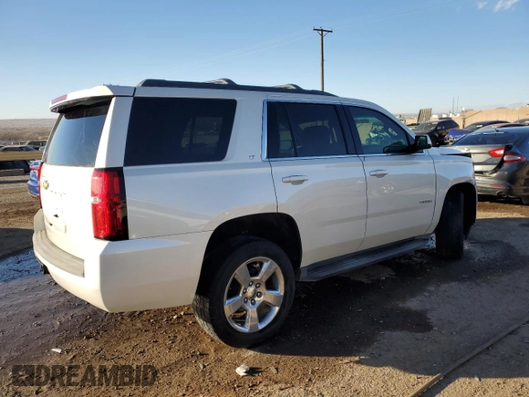 2015 Chevrolet Tahoe LT with VIN 1GNSCBKC2FR738042, listed as a Copart auction lot 84856214 with 144,325 mi miles and Salvage title. Bid and sale history available at DreamBid. Image 3.