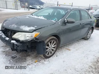 2014 Toyota Camry L with VIN 4T1BF1FK5EU774116, listed as a IAAI auction lot 41286569 with 184,797 mi miles. Bid and sale history available at carsss.com. Image 2.