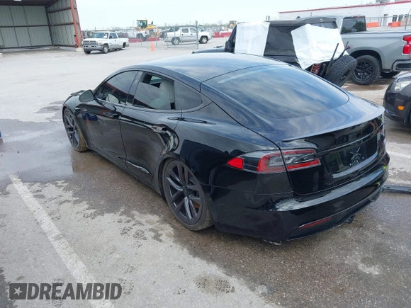 2022 Tesla Model S Plaid with VIN 5YJSA1E60NF460244, listed as a IAAI auction lot 41996403 with Not provided miles and . Bid and sale history available at DreamBid. Image 3.