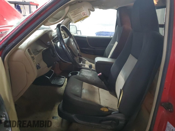 2004 Ford Ranger XL with VIN 1FTYR10D44PA94527, listed as a Copart auction lot 56558655 with 242,941 mi miles and Salvage title. Bid and sale history available at DreamBid. Image 7.
