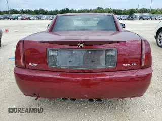 2006 Cadillac XLR z VIN 1G6YX36D165603774, wystawiony jako Copart lot #74369974 z przebiegiem Nie podano mil oraz Szkody całkowita. Historia ofert i sprzedaży dostępna na DreamBid. Obrazek 6.