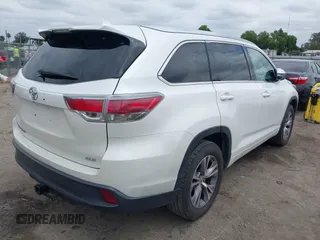 2015 Toyota Highlander XLE z VIN 5TDKKRFH0FS076120, wystawiony jako IAAI lot #42131646 z przebiegiem 117 623 mil mil oraz . Historia ofert i sprzedaży dostępna na DreamBid. Obrazek 4.