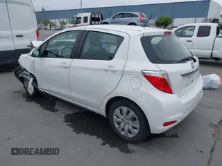 2012 Toyota Yaris L with VIN JTDKTUD38CD513912, listed as a IAAI auction lot 42131567 with 133,664 mi miles. Bid and sale history available at carsss.com. Image 3.