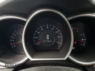 2015 Kia Optima EX with VIN 5XXGN4A75FG455808, listed as a Copart auction lot 60848114 with 130,643 mi miles and Salvage Title. Bid and sale history available at carsss.com. Image 9.
