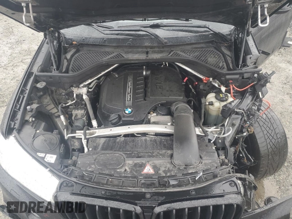 2016 BMW X6 xDrive35i z VIN 5UXKU2C56G0N80105, wystawiony jako Copart lot #46983345 z przebiegiem 99 913 mil mil oraz Szkoda całkowita • Salvage title. Historia ofert i sprzedaży dostępna na DreamBid. Obrazek 13.
