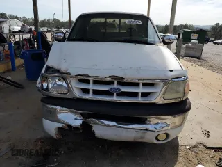1997 Ford F-150 z VIN 1FTDX0766VKA86983, wystawiony jako Copart lot #50896215 z przebiegiem 214 746 mil mil oraz Szkoda całkowita • Salvage title. Historia ofert i sprzedaży dostępna na DreamBid. Obrazek 5.