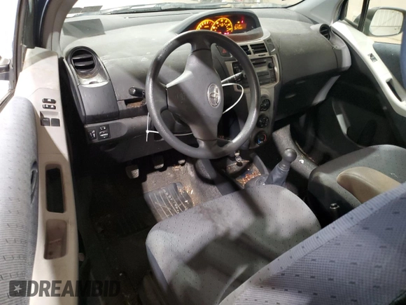 2010 Toyota Yaris z VIN JTDJT4K39A5292522, wystawiony jako Copart lot #58588655 z przebiegiem 115 909 mil mil oraz Szkoda całkowita • Salvage title. Historia ofert i sprzedaży dostępna na DreamBid. Obrazek 8.