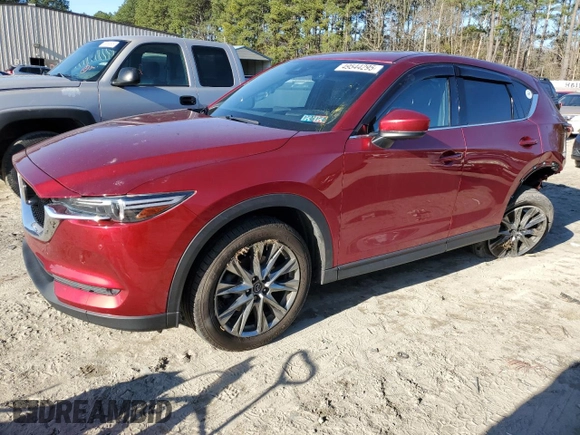 2019 Mazda CX-5 Signature with VIN JM3KFBEY2K0629688, listed as a Copart auction lot 49544295 with 51,261 mi miles and Salvage Title. Bid and sale history available at carsss.com. Image 1.