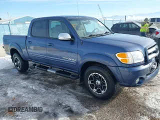 2004 Toyota Tundra SR5 with VIN 5TBDT44184S458982, listed as a IAAI auction lot 41369857 with 115,257 mi miles and . Bid and sale history available at DreamBid. Image 1.