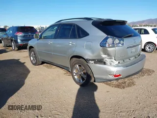 2006 Lexus RX 400h with VIN JTJHW31U560026104, listed as a IAAI auction lot 41311951 with 246,861 mi miles and . Bid and sale history available at DreamBid. Image 3.