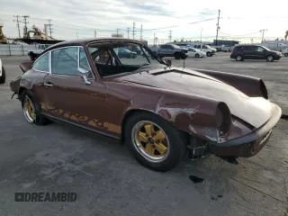 1975 Porsche 911 with VIN 9115201599, listed as a Copart auction lot 79267654 with 69,699 mi miles and Salvage title. Bid and sale history available at DreamBid. Image 4.