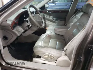 2003 Cadillac DeVille with VIN 1G6KD54Y43U124198, listed as a Copart auction lot 44515215 with 116,006 mi miles and Salvage Title. Bid and sale history available at carsss.com. Image 7.