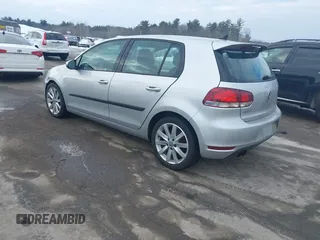 2013 Volkswagen Golf TDI z VIN WVWDM7AJ7DW137767, wystawiony jako IAAI lot #41548852 z przebiegiem 102 984 mil mil oraz . Historia ofert i sprzedaży dostępna na DreamBid. Obrazek 3.