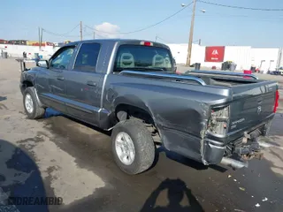 2005 Dodge Dakota SLT with VIN 1D7HE48N75S365305, listed as a IAAI auction lot 41450254 with 181,941 mi miles. Bid and sale history available at carsss.com. Image 3.