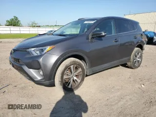 2018 Toyota RAV4 XLE with VIN 2T3WFREV0JW517488, listed as a Copart auction lot 51000975 with 68,105 mi miles and Salvage title. Bid and sale history available at DreamBid. Image 1.