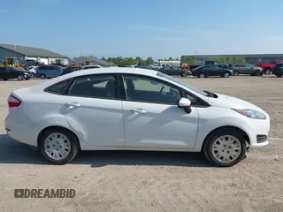 2014 Ford Fiesta S z VIN 3FADP4AJXEM211776, wystawiony jako IAAI lot #42574815 z przebiegiem 174 043 mil mil oraz . Historia ofert i sprzedaży dostępna na DreamBid. Obrazek 13.