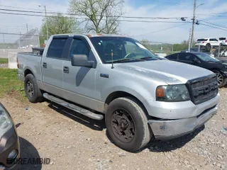 2005 Ford F-150 XLT with VIN 1FTPW12505KD72168, listed as a IAAI auction lot 42063810 with 232,964 mi miles. Bid and sale history available at carsss.com. Image 1.