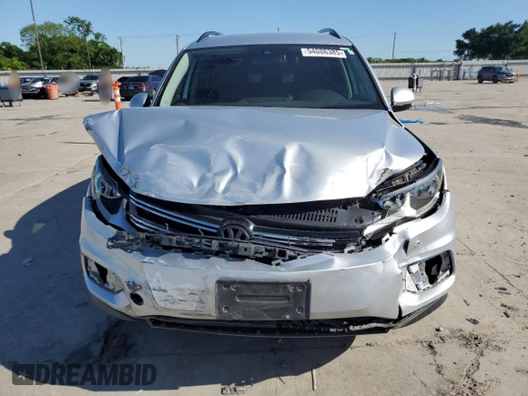 2017 Volkswagen Tiguan S with VIN WVGAV7AX3HK008793, listed as a Copart auction lot 54086385 with 82,400 mi miles and Salvage Title. Bid and sale history available at DreamBid. Image 5.