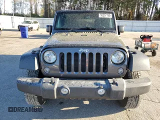 2016 Jeep Wrangler Willys Wheeler with VIN 1C4AJWAG5GL266235, listed as a Copart auction lot 50237195 with 60,830 mi miles and Salvage title. Bid and sale history available at DreamBid. Image 5.