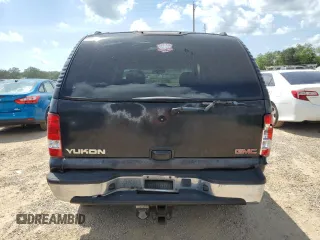2002 GMC Yukon SLT z VIN 1GKEC13Z42J333817, wystawiony jako Copart lot #54819725 z przebiegiem 302 313 mil mil oraz Szkoda całkowita • Salvage title. Historia ofert i sprzedaży dostępna na DreamBid. Obrazek 6.