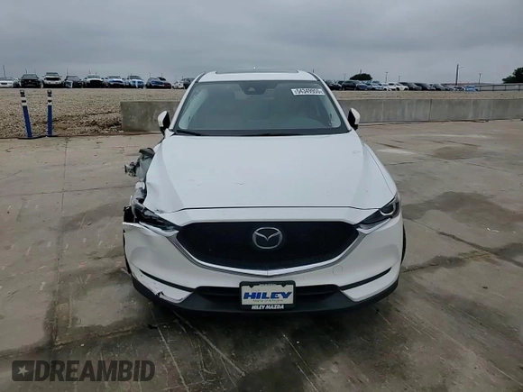 2018 Mazda CX-5 Touring z VIN JM3KFACM0J0469433, wystawiony jako Copart lot #54349955 z przebiegiem Nie podano mil oraz Szkoda całkowita • Salvage title. Historia ofert i sprzedaży dostępna na DreamBid. Obrazek 14.