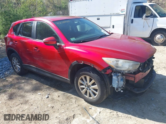 2015 Mazda CX-5 Touring with VIN JM3KE4CY1F0510361, listed as a IAAI auction lot 42134415 with 95,907 mi miles and . Bid and sale history available at carsss.com. Image 1.