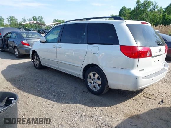 2009 Toyota Sienna XLE with VIN 5TDZK22C19S262107, listed as a IAAI auction lot 42158864 with 186,711 mi miles. Bid and sale history available at carsss.com. Image 3.