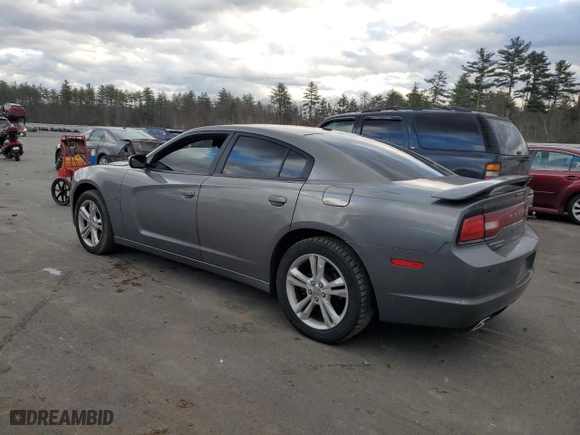 2011 Dodge Charger RT Max with VIN 2B3CM5CTXBH610699, listed as a Copart auction lot 79752424 with 153,630 mi miles and Salvage Title. Bid and sale history available at carsss.com. Image 2.
