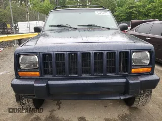 1997 Jeep Cherokee Country with VIN 1J4FJ78S4VL589852, listed as a Copart auction lot 56294015 with 189,530 mi miles and Salvage title. Bid and sale history available at DreamBid. Image 5.