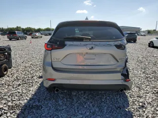 2024 Mazda CX-5 S Carbon Edition with VIN JM3KFBCL9R0434429, listed as a Copart auction lot 52990075 with 12,565 mi miles and Salvage Title. Bid and sale history available at DreamBid. Image 6.