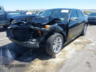 2016 Chrysler 300 C with VIN 2C3CCAEG8GH113057, listed as a IAAI auction lot 42052936 with 543,975 mi miles and . Bid and sale history available at DreamBid. Image 2.