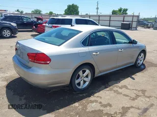 2013 Volkswagen Passat SE with VIN 1VWBP7A37DC140683, listed as a IAAI auction lot 42245864 with 125,898 mi miles and . Bid and sale history available at DreamBid. Image 4.