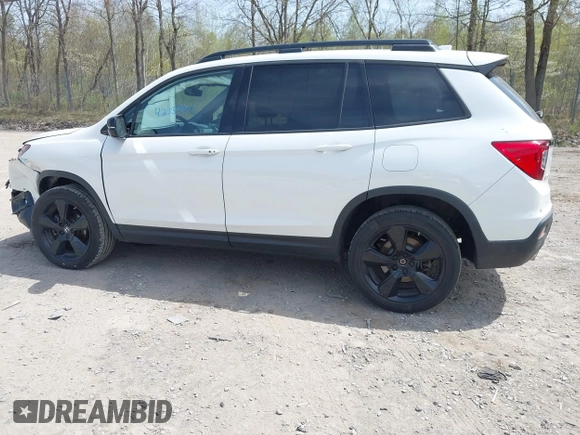 2021 Honda Passport Elite z VIN 5FNYF8H08MB014739, wystawiony jako IAAI lot #42137913 z przebiegiem 50 580 mil mil oraz . Historia ofert i sprzedaży dostępna na DreamBid. Obrazek 14.