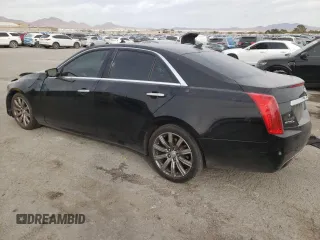 2014 Cadillac CTS Premium AWD z VIN 1G6AZ5SX7E0158072, wystawiony jako Copart lot #79503204 z przebiegiem 86 777 mil mil oraz Szkoda całkowita • Salvage title. Historia ofert i sprzedaży dostępna na DreamBid. Obrazek 2.