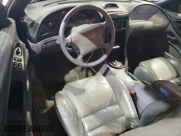 1994 Ford Mustang GT z VIN 1FALP42T5RF144134, wystawiony jako Copart lot #54272735 z przebiegiem 241 478 mil mil oraz Szkoda całkowita • Salvage title. Historia ofert i sprzedaży dostępna na DreamBid. Obrazek 8.