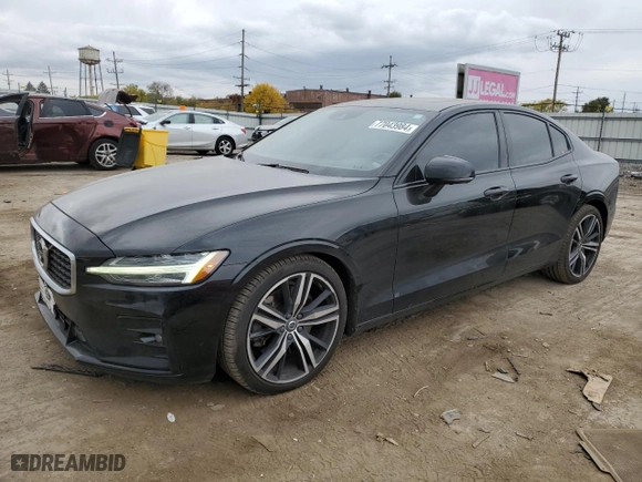 2020 Volvo S60 R-Design with VIN 7JRA22TM6LG038242, listed as a Copart auction lot 77043984 with 103,382 mi miles and Salvage Title. Bid and sale history available at carsss.com. Image 1.