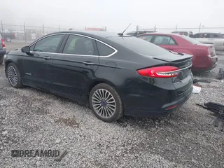 2018 Ford Fusion Titanium with VIN 3FA6P0RU7JR182119, listed as a IAAI auction lot 41984816 with 146,748 mi miles and . Bid and sale history available at DreamBid. Image 3.
