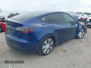 2022 Tesla Model Y Long Range z VIN 7SAYGDEE9NA002493, wystawiony jako IAAI lot #41756460 z przebiegiem 68 315 mil mil oraz . Historia ofert i sprzedaży dostępna na DreamBid. Obrazek 4.