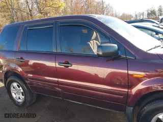 2007 Honda Pilot LX with VIN 2HKYF18167H510970, listed as a IAAI auction lot 40827681 with 119,011 mi miles. Bid and sale history available at carsss.com. Image 13.