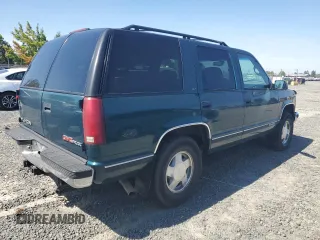 1996 GMC Yukon with VIN 1GKEK13R3TJ750284, listed as a Copart auction lot 69022244 with 266,366 mi miles and Salvage Title. Bid and sale history available at carsss.com. Image 3.