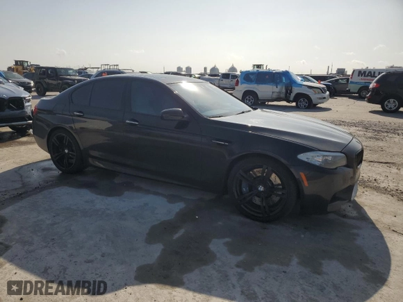2013 BMW M5 with VIN WBSFV9C58DC772881, listed as a Copart auction lot 48230075 with 0 mi miles and Salvage Title. Bid and sale history available at carsss.com. Image 4.