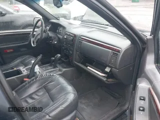 2001 Jeep Grand Cherokee Limited with VIN 1J4GW58S21C673916, listed as a IAAI auction lot 42127522 with Not Provided miles and . Bid and sale history available at DreamBid. Image 5.